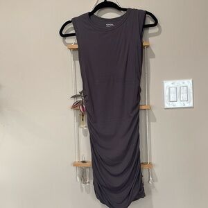 Purple-grey bodycon dress.